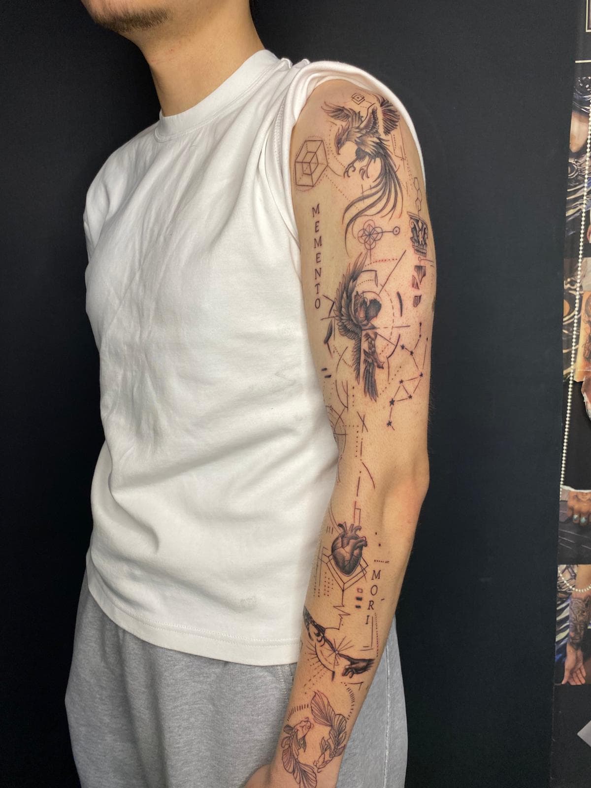 Tam kol ince çizgi sleeve: anka, melek, anatomik kalp, MEMENTO MORI — Ersin Tattoo Bakırköy